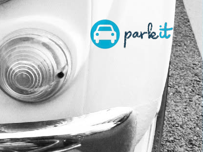 The park it logo over the front of a classic car.
